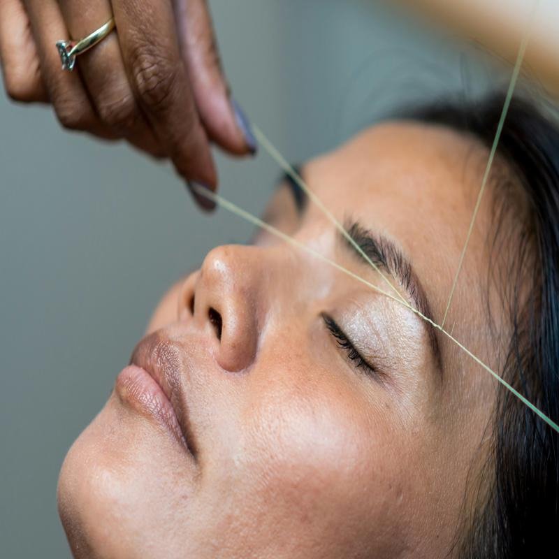 Eyebrow threading treatment close-up at Threading Station East Grinstead
