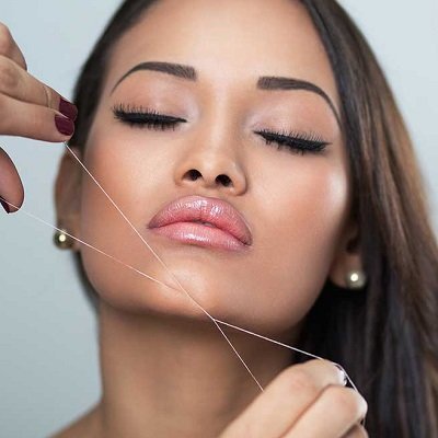 Eyebrow threading treatment close-up at Threading Station East Grinstead